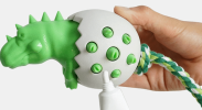 Dinosaur in Egg Doggie Toothbrush Chew Toy